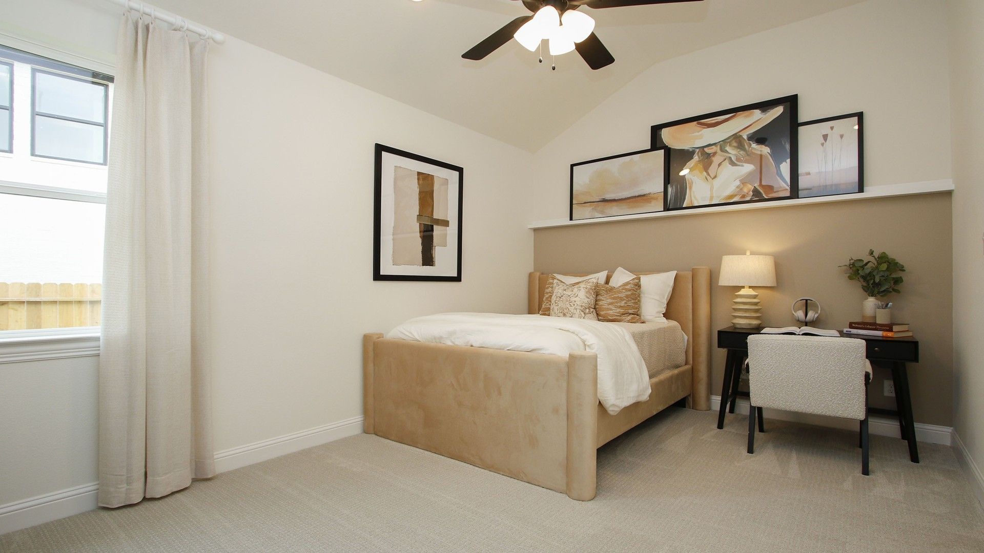 Experience refined comfort with plush textures and sleek art in this Woodlands Hills bedroom.