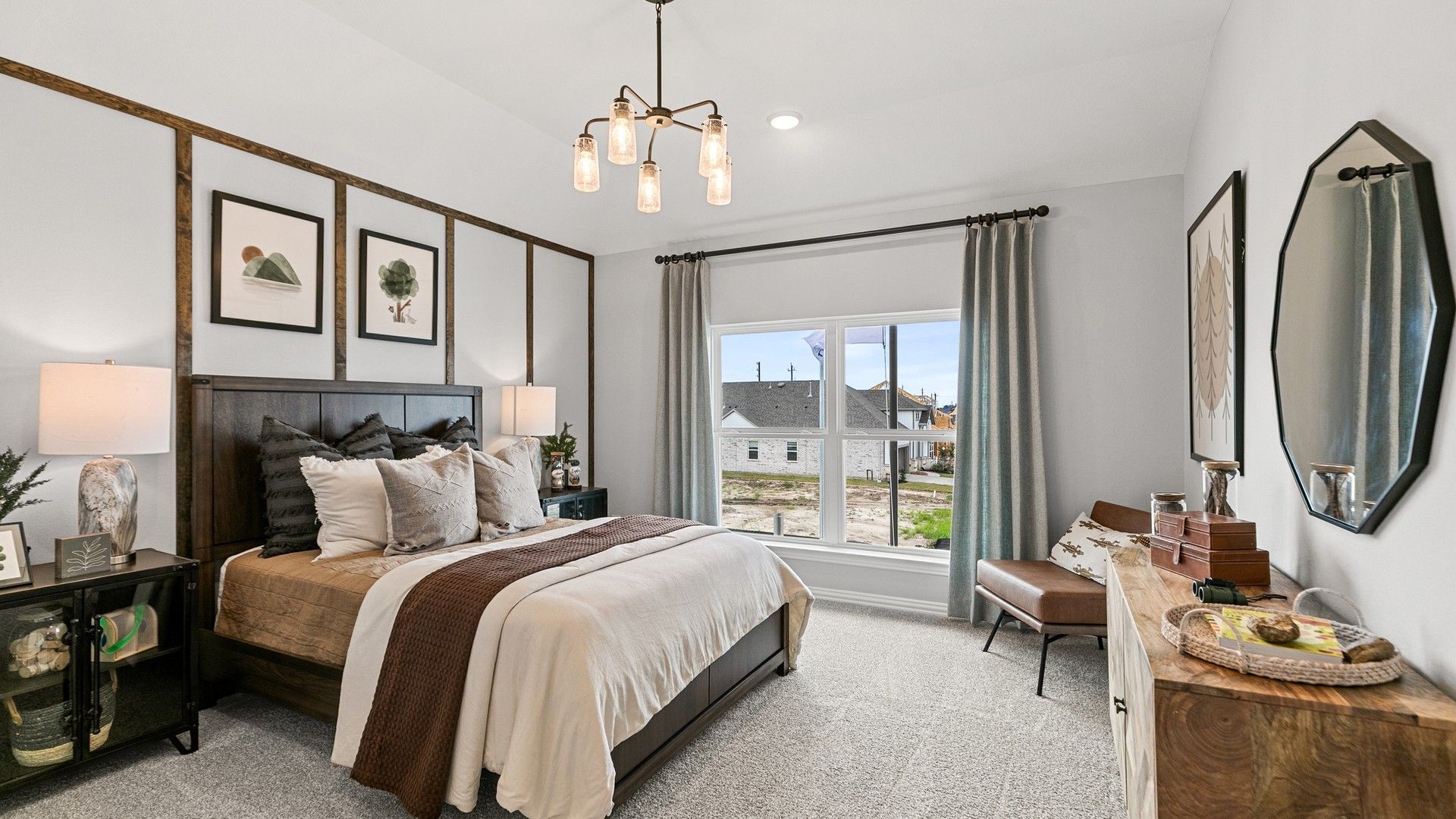 Sophisticated wood paneling and elegant lighting define this Beamer Villas bedroom.