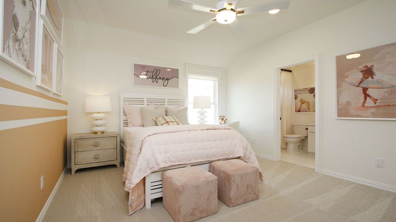 Elegant pastel tones and modern artwork elevate this Woodlands Hills bedroom's refined ambiance.