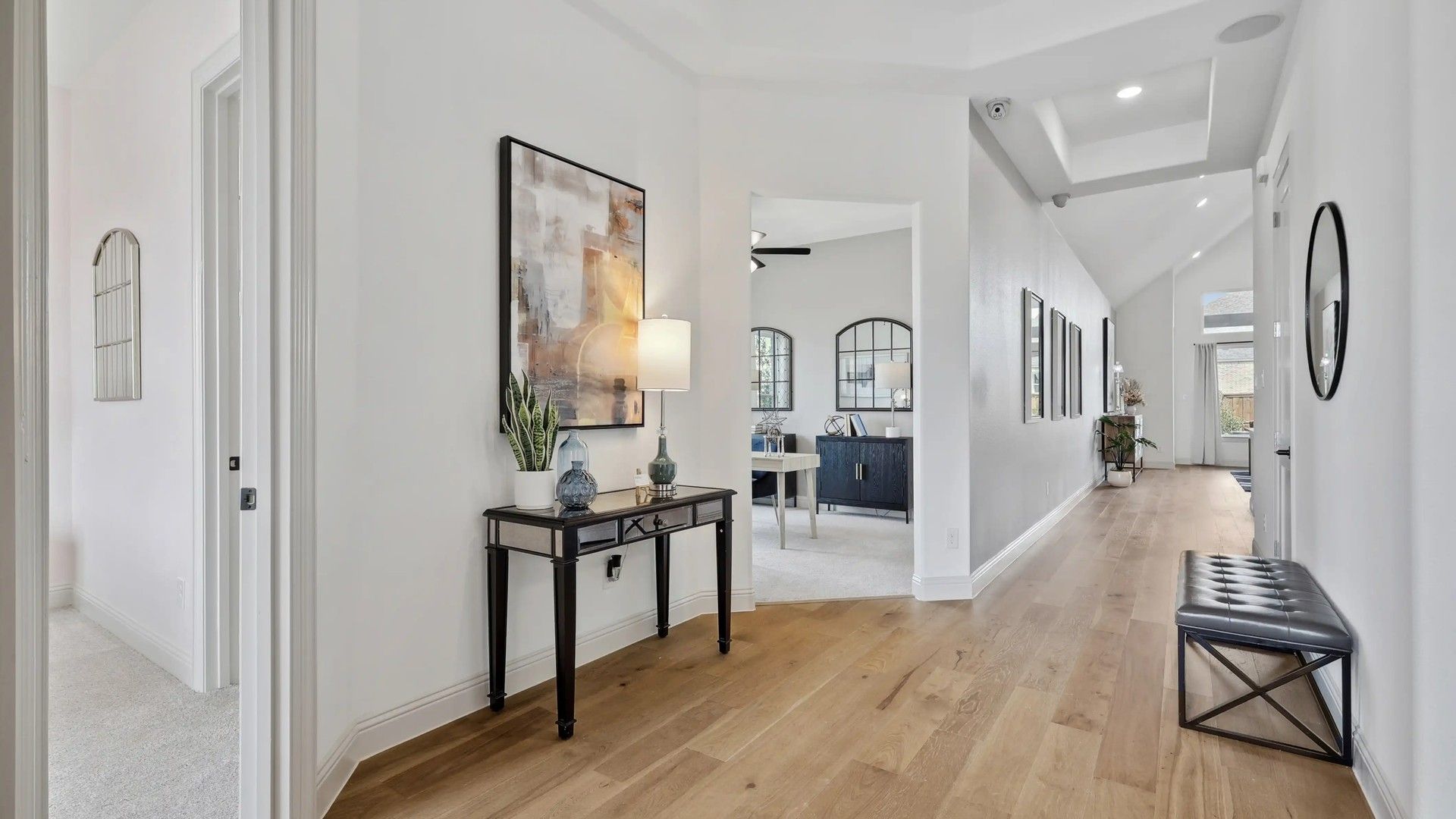 Refined hardwood floors and recessed lighting define this upscale Westside Preserve residence.