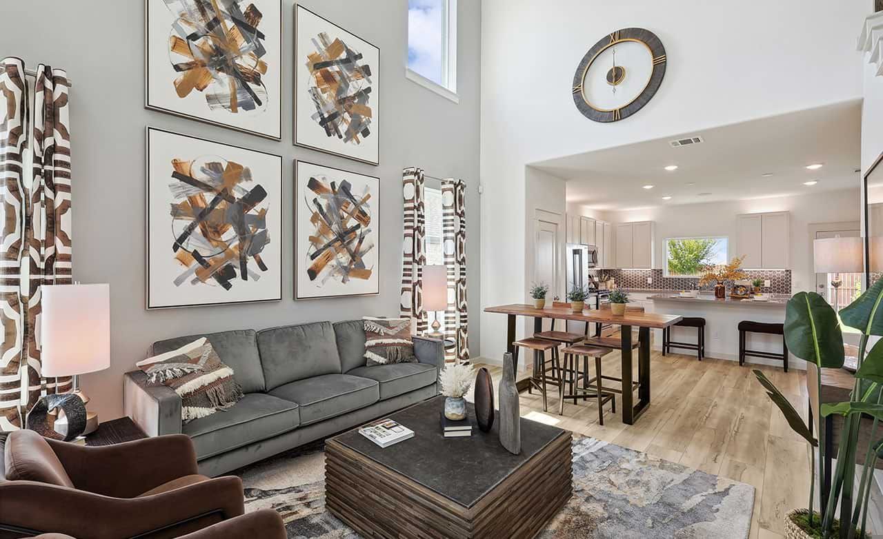 Experience elegance with tall ceilings, abstract art, and fine wood finishes at Walden Pond.