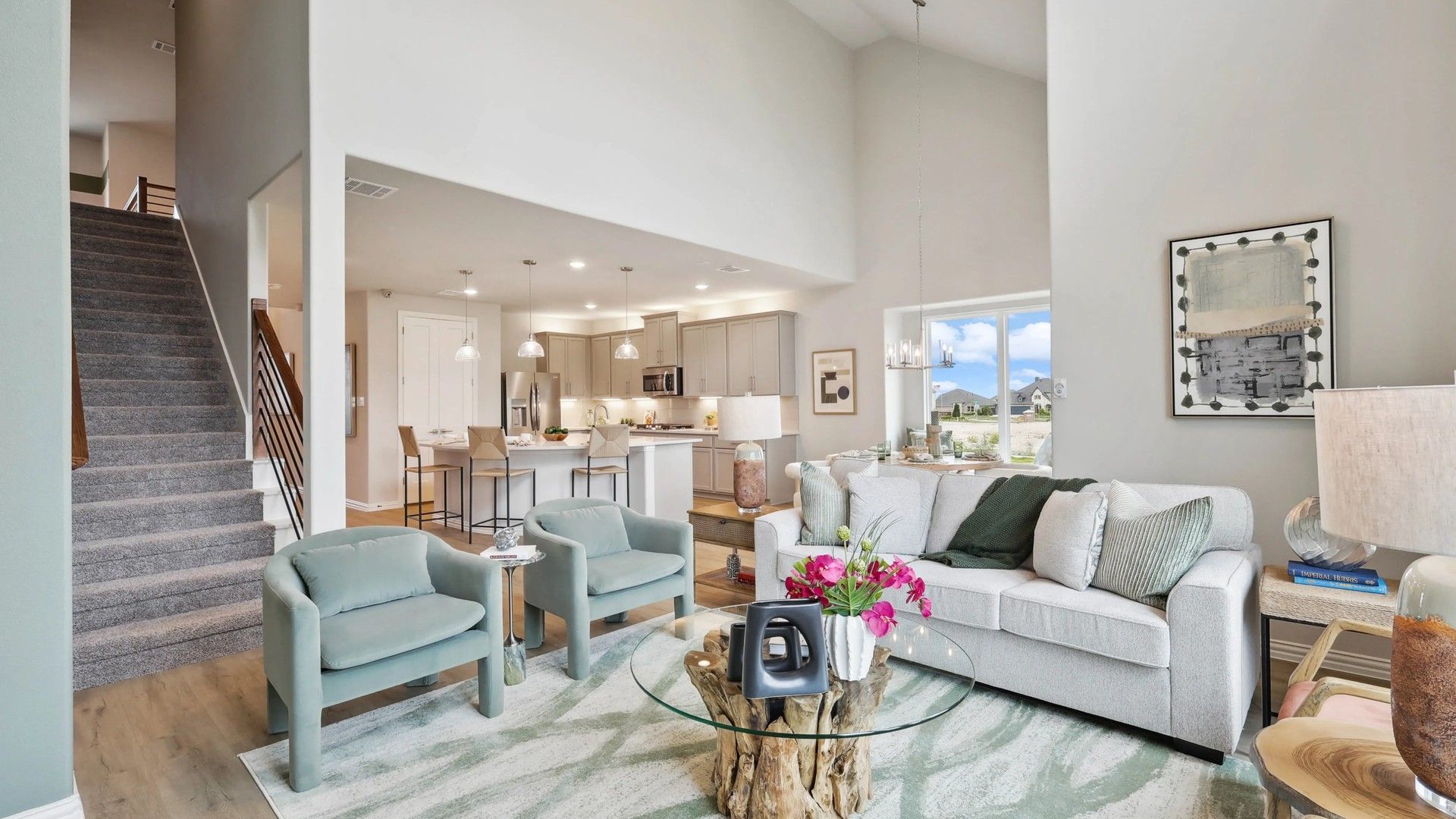 Soaring ceilings accentuated by panoramic windows define luxury in Hulen Trails, Texas.