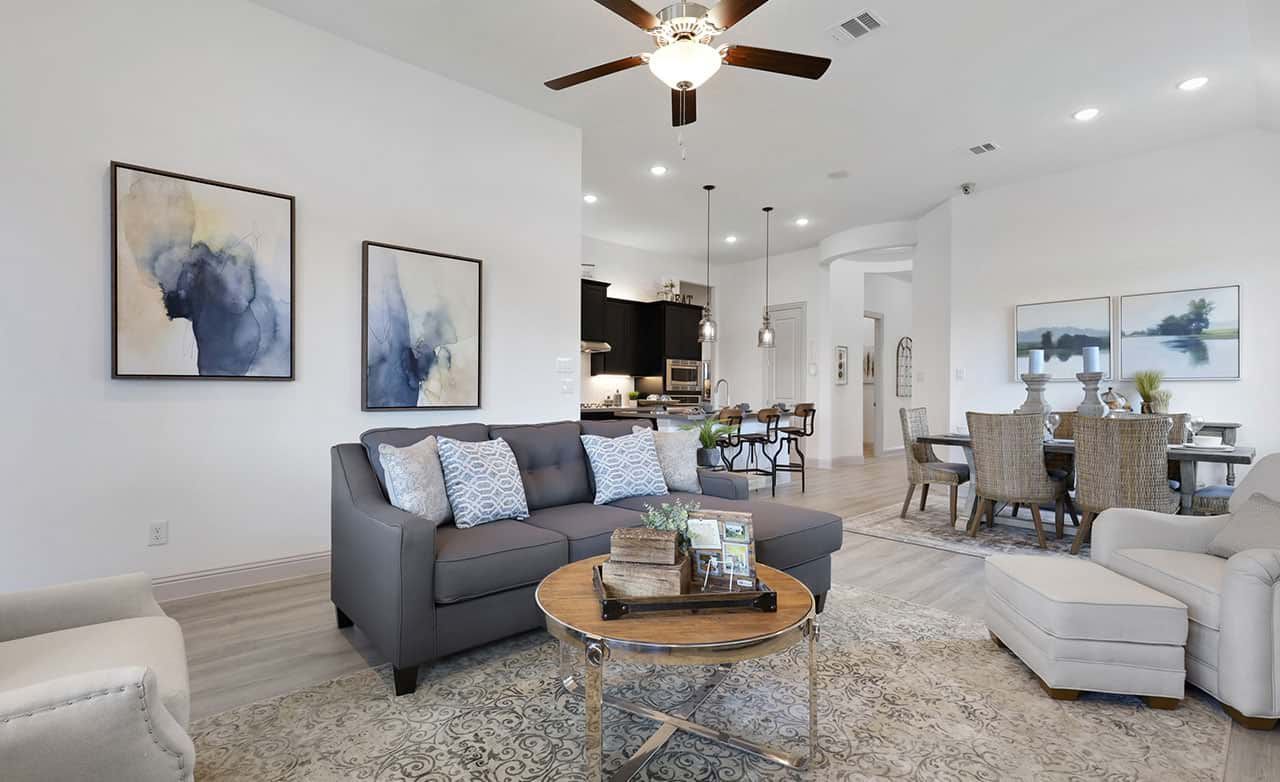 Experience sophisticated elegance with open layout, plush seating, and refined finishes in Thompson Farms.