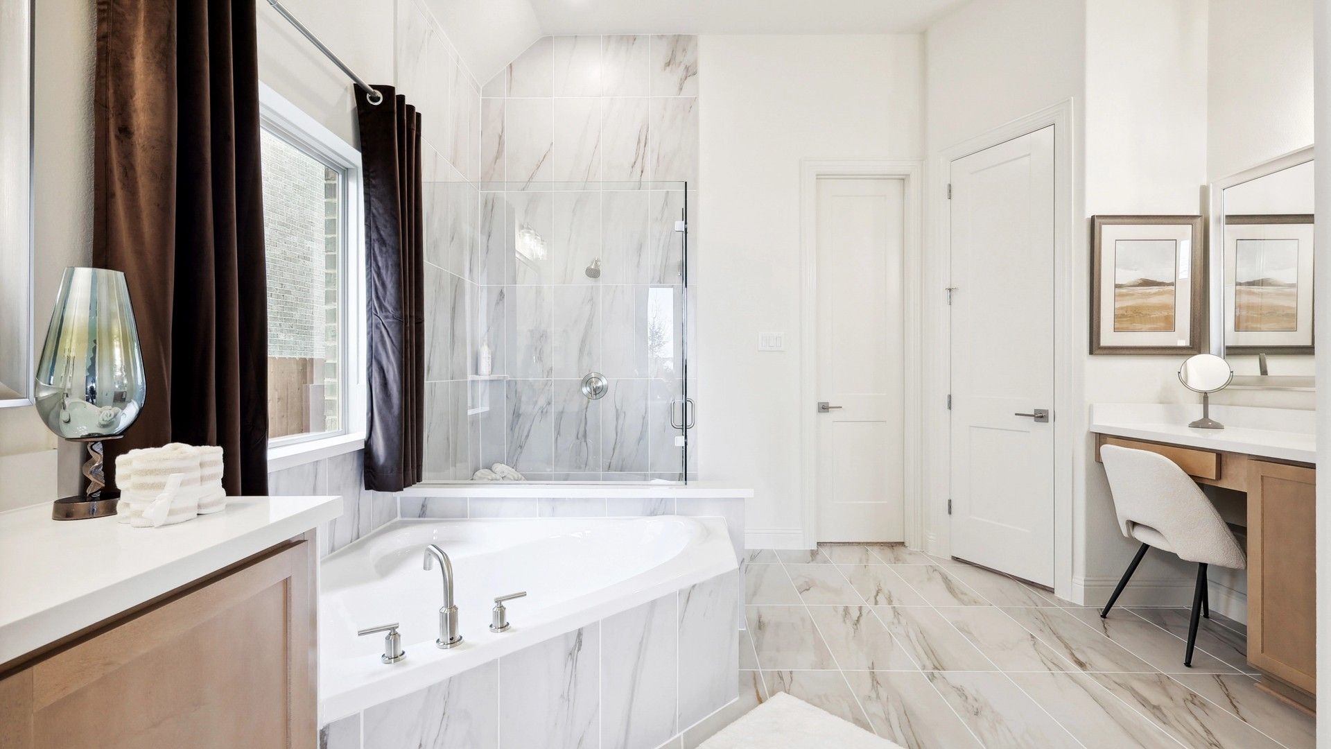 Experience opulence with stunning marble tiles, sleek fixtures, and a serene soaking tub at The Oaks.