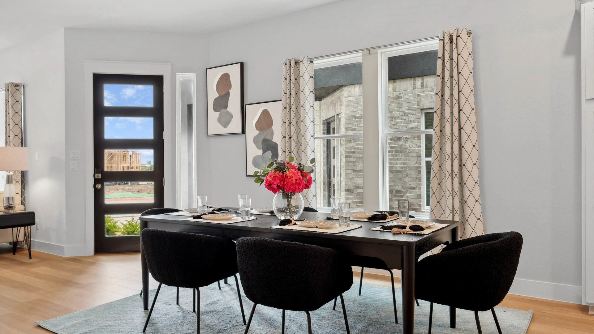 Experience refined elegance with sleek furnishings and ample natural light in Collin Creek.