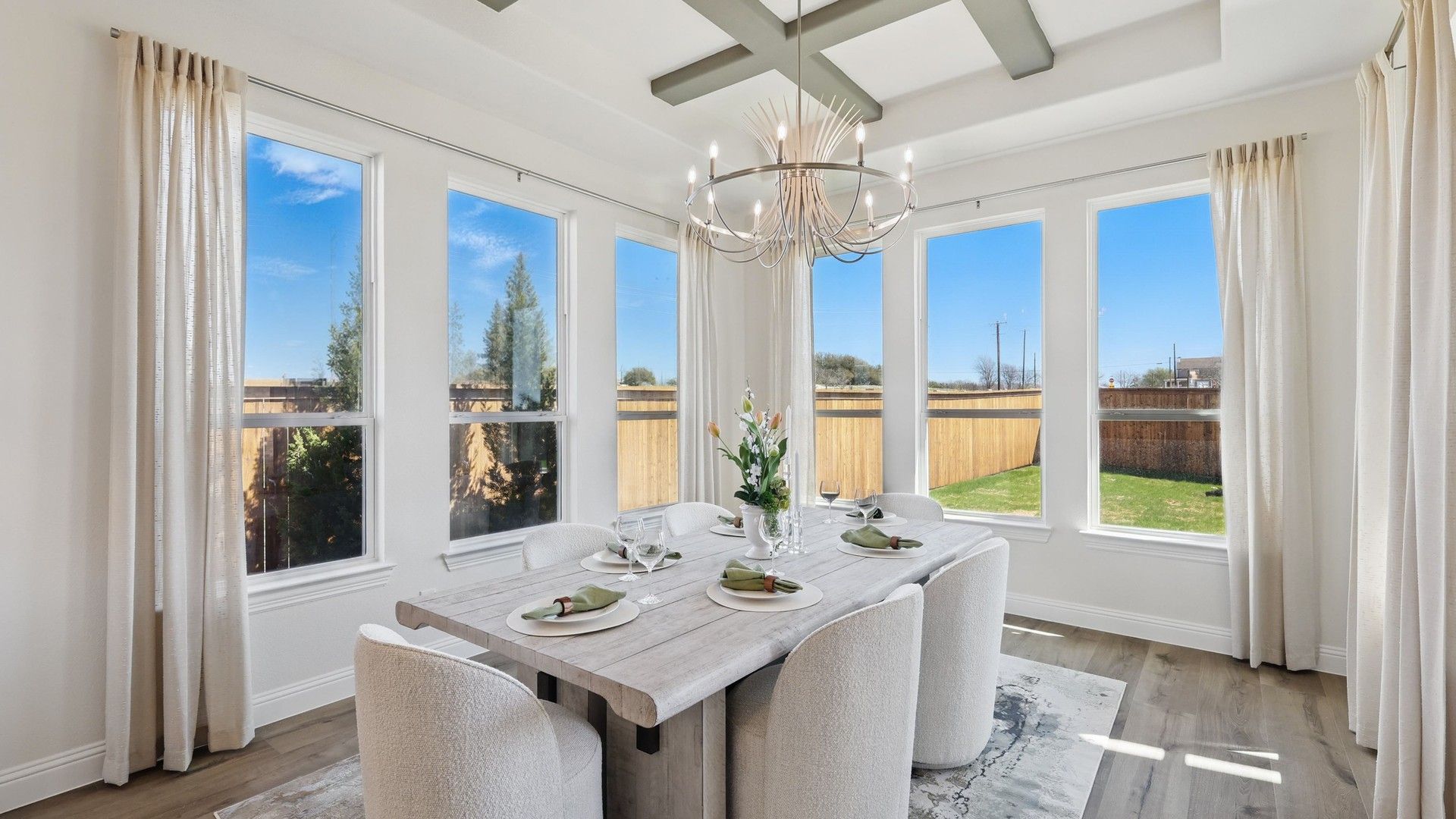 Experience sophistication with coffered ceilings and sunlit windows in Rio Vista, Kelly Ranch.