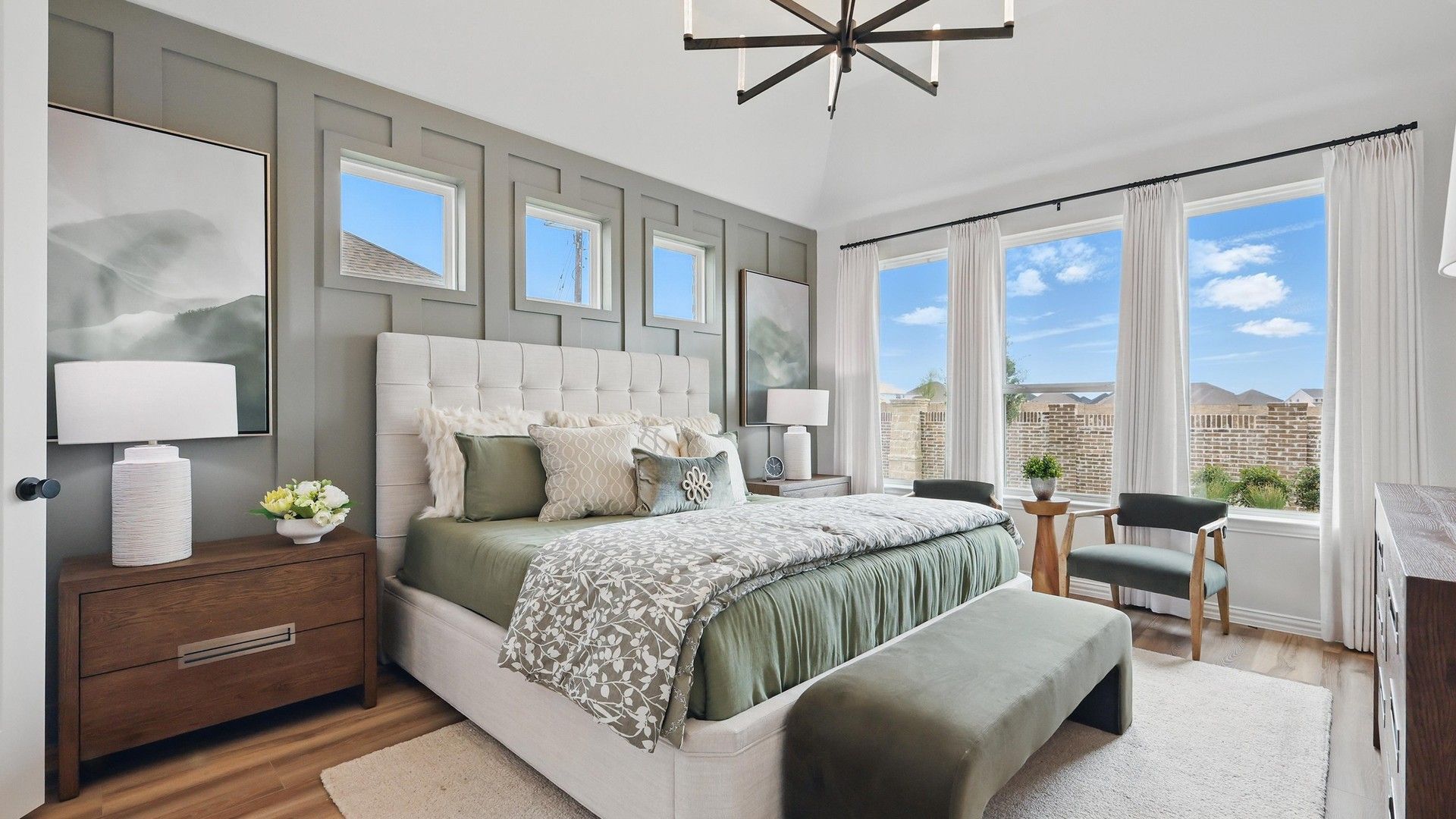 Experience opulence with a chic light fixture and expansive windows in the exclusive Westridge community.