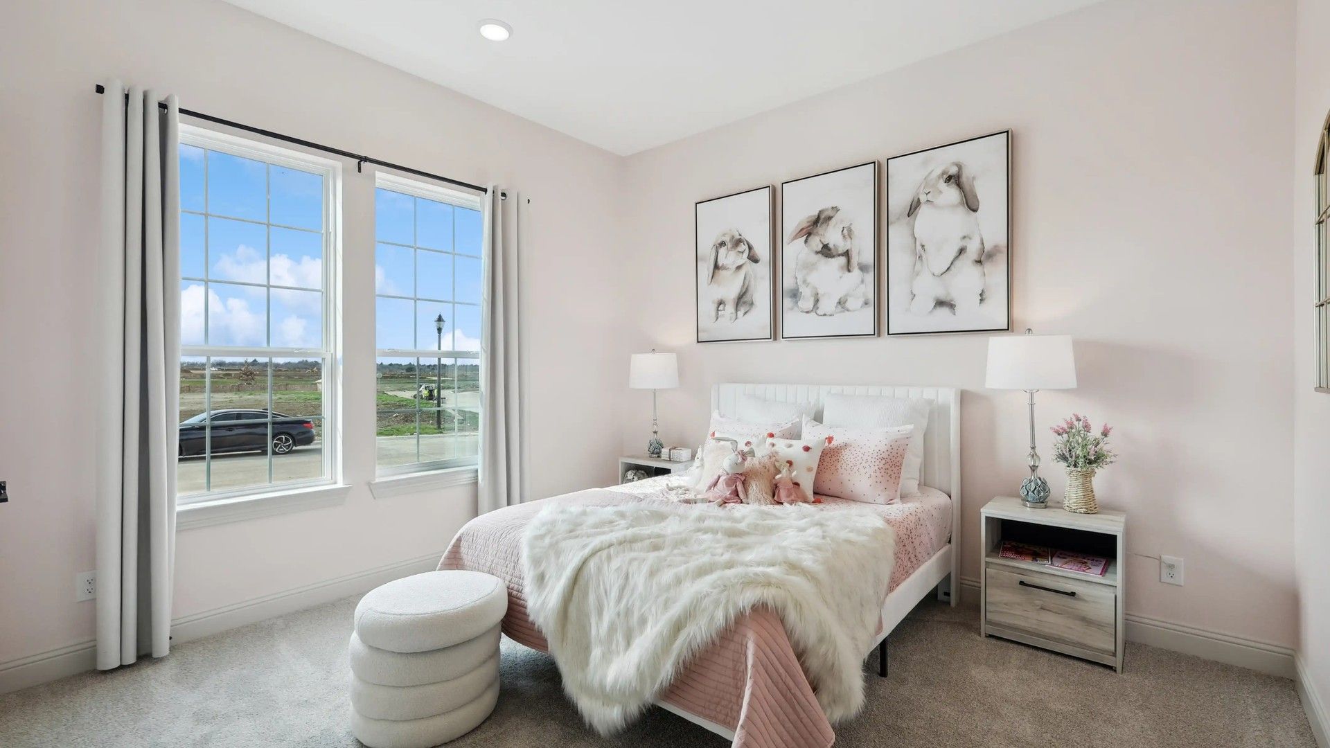 Discover plush textures and expansive views in this Westside Preserve sanctuary bedroom.