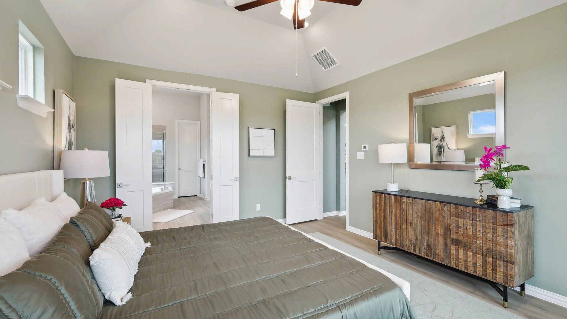 Experience luxury with high ceilings, a calming palette, and chic wooden elements in Hulen Trails.