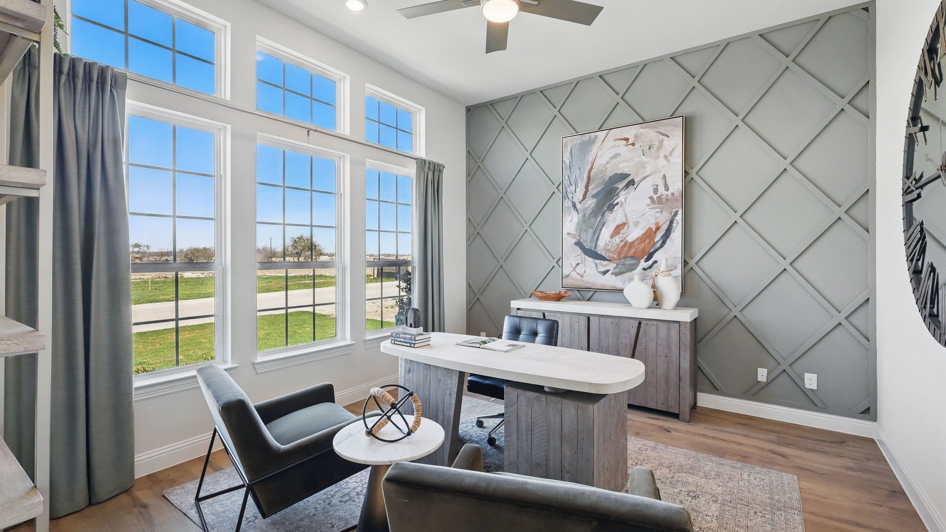 Experience elegance with expansive windows and a diamond-crafted accent wall, Rio Vista at Kelly Ranch.