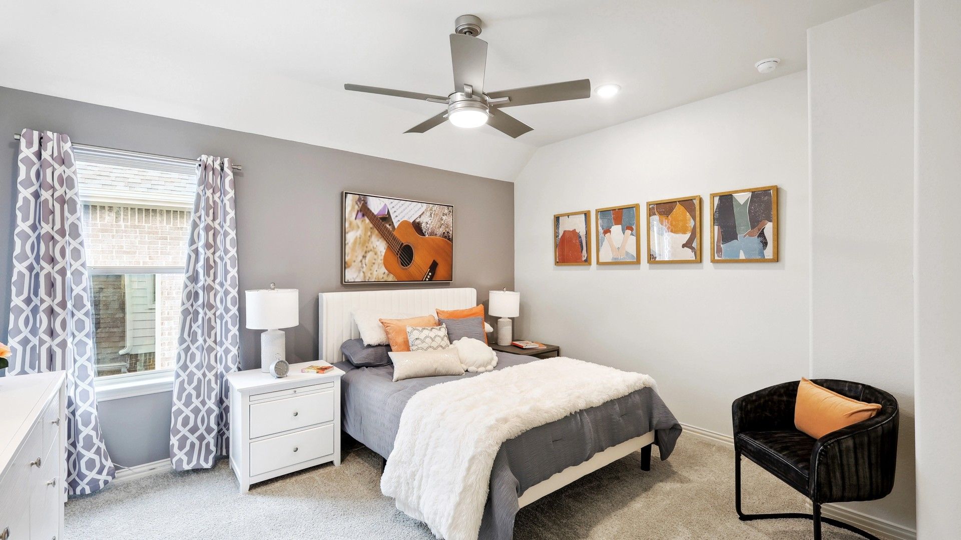 Discover luxurious comfort in a chic bedroom featuring plush fabrics and stunning artwork at The Oaks.