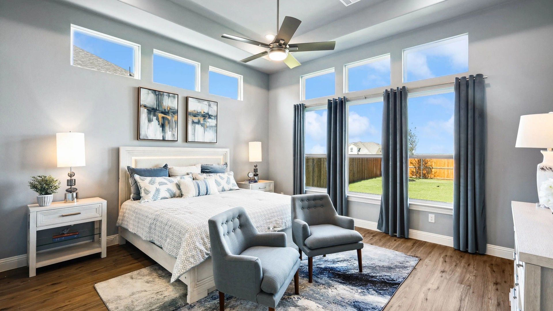 Polished hardwood floors and expansive windows define refined living in Ridge Crossing.