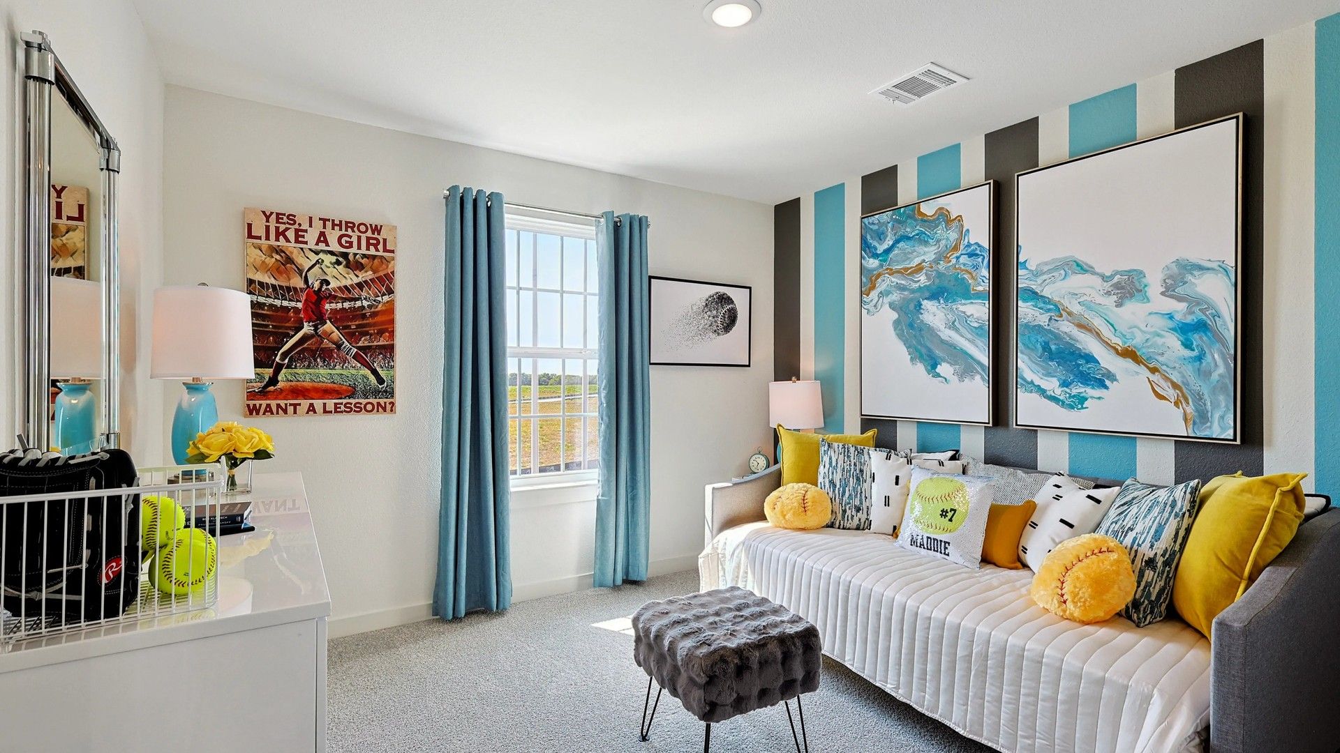 Elegant striped walls and abstract artwork create a sophisticated kids' retreat at Patriot Estates.