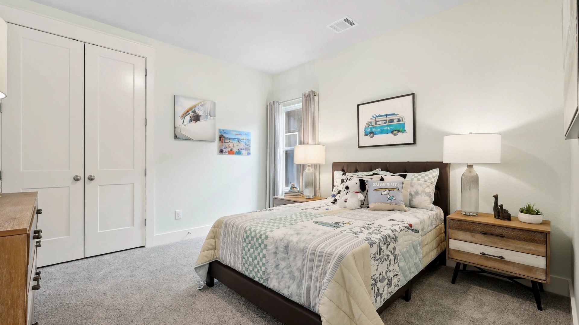 Experience refined comfort with exquisite patterned bedding and curated decor in Collin Creek's premier homes.