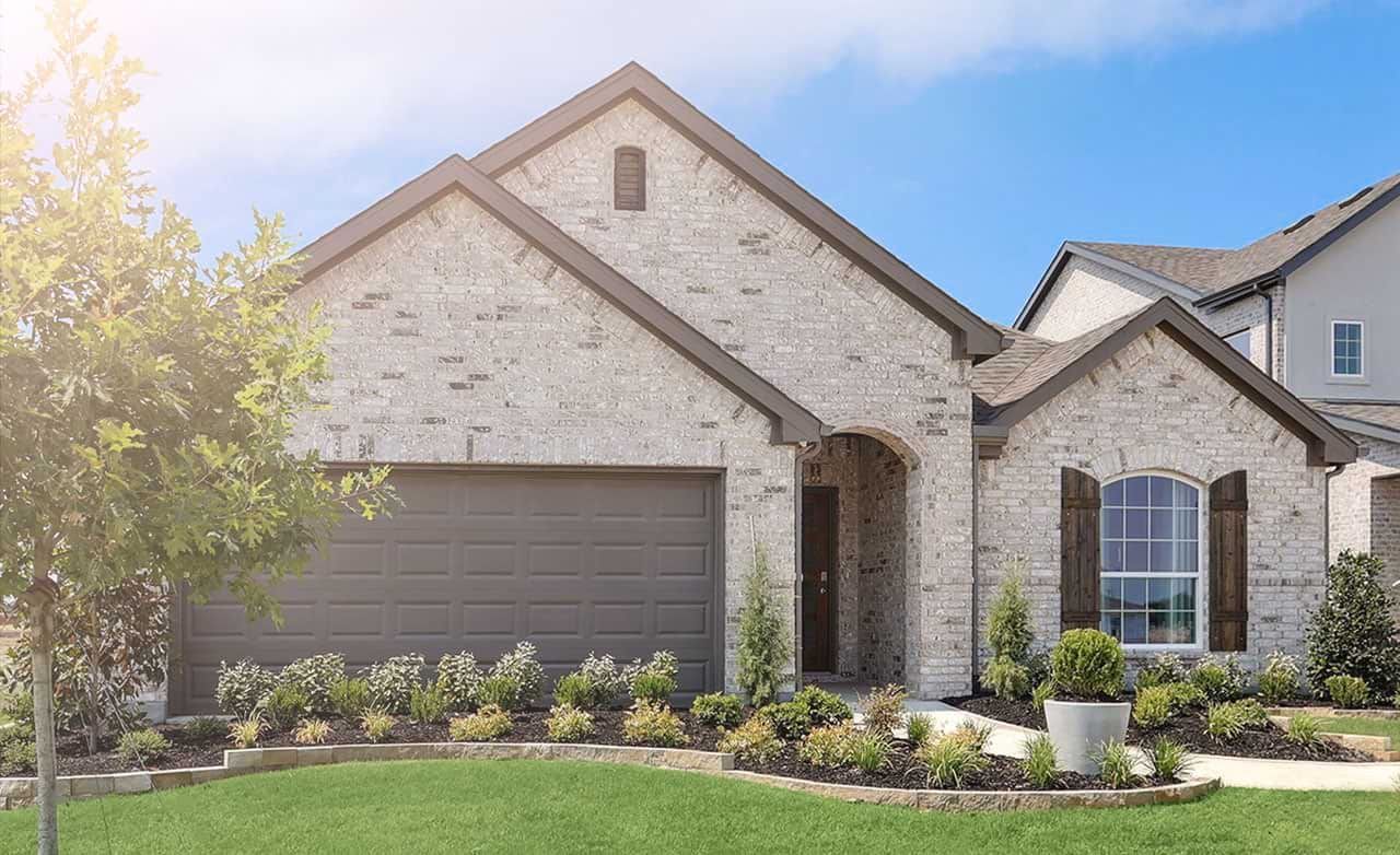 Elegant brick exterior with arched entry and landscaped garden in Walden Pond. Classic charm.