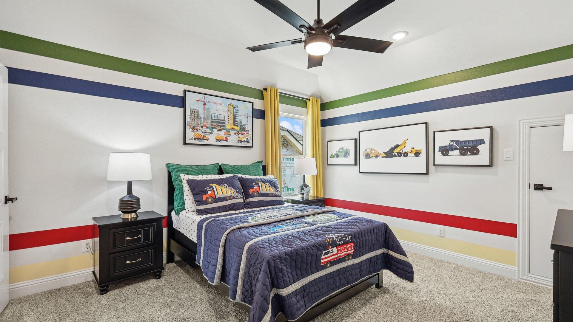Elegant kid's room with bold stripes and custom construction-themed accents in Green Meadows.