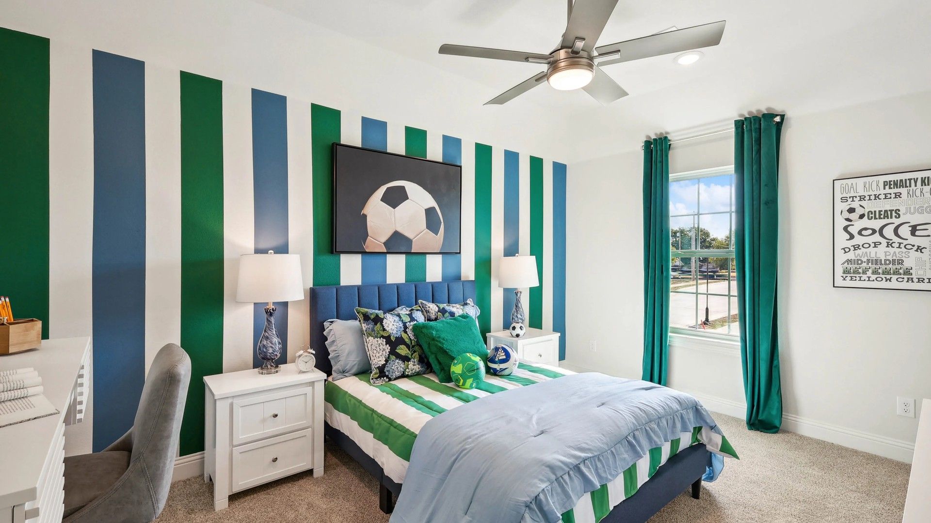 Vibrant striped walls and elegant ceiling fan enhance Ridge Crossing's refined decor.