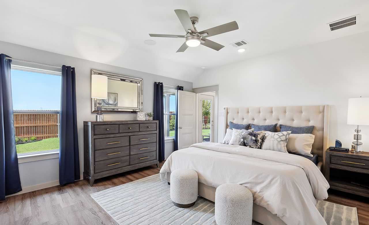 Experience refined living with a chic tufted bed, elegant decor, and pristine hardwood in Walden Pond.