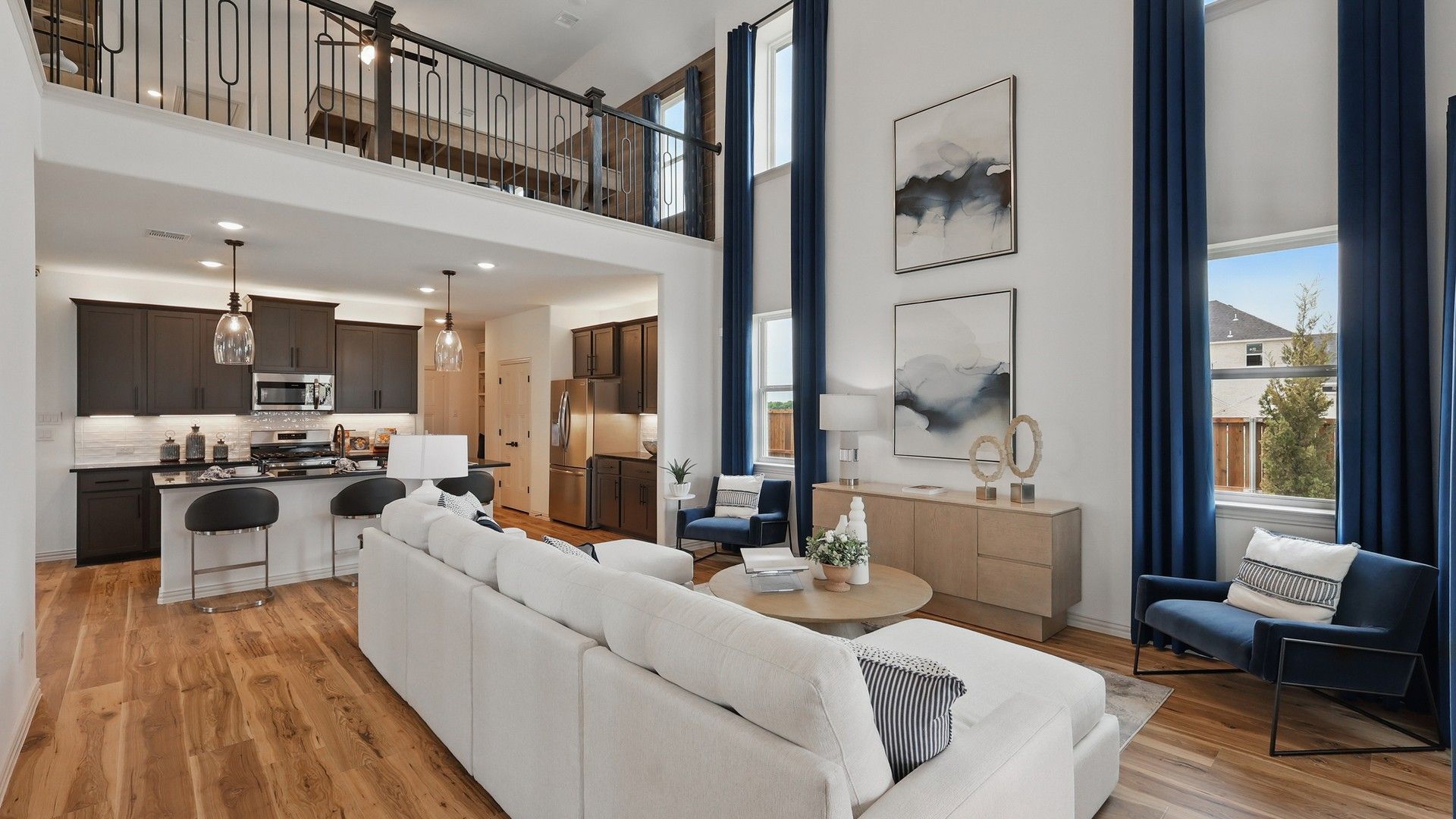 Experience luxury with soaring ceilings, refined wood floors, and elegant balcony in Westridge's premier home.