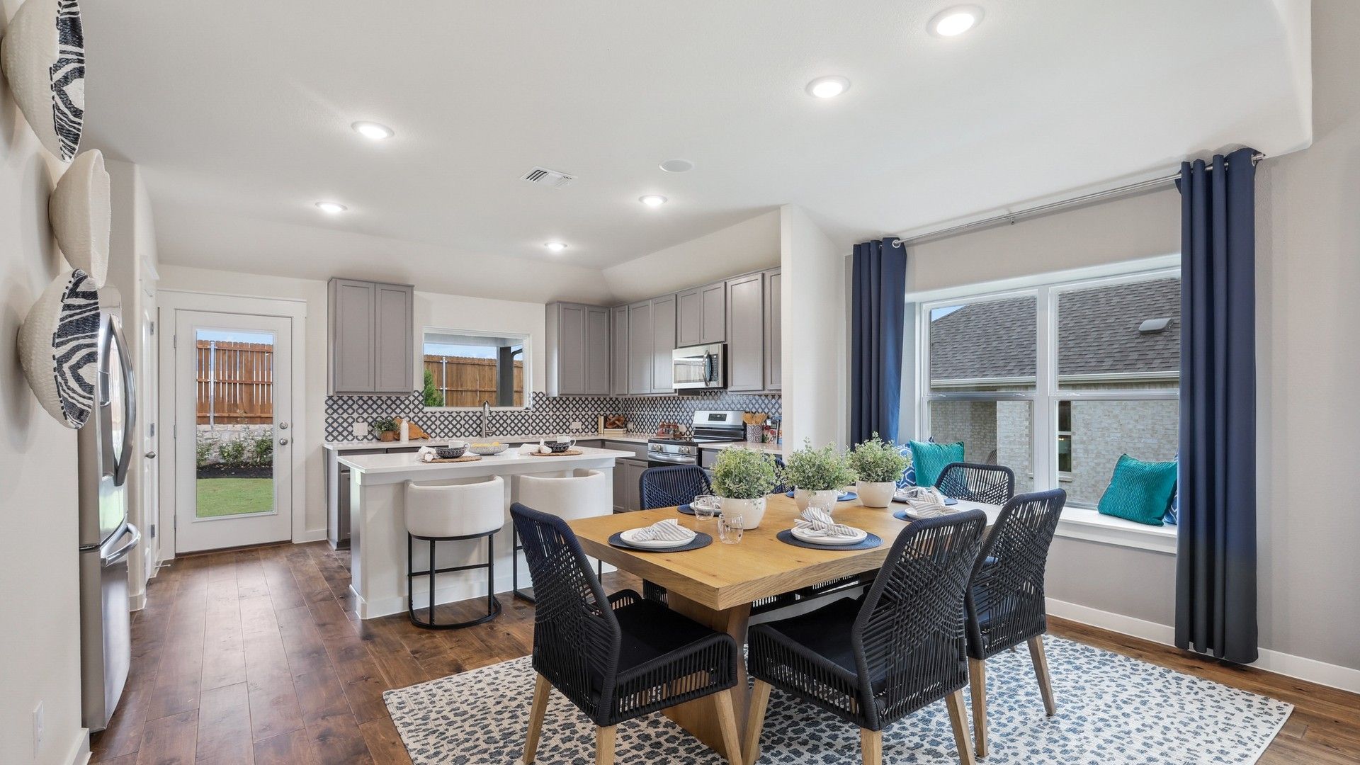 Elegant hardwood floors and sleek cabinetry enhance this sophisticated Churchill home.