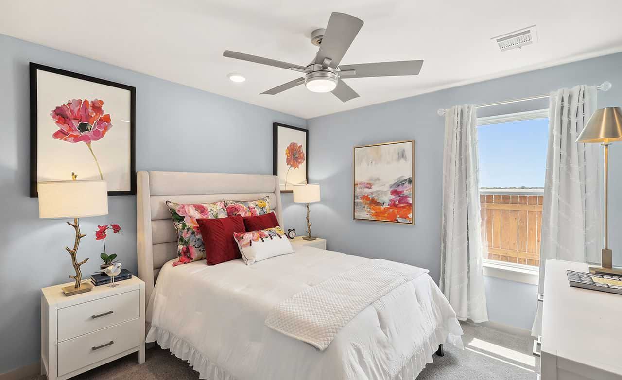 Experience luxury with exquisite floral art and plush textures in this Walden Pond bedroom.