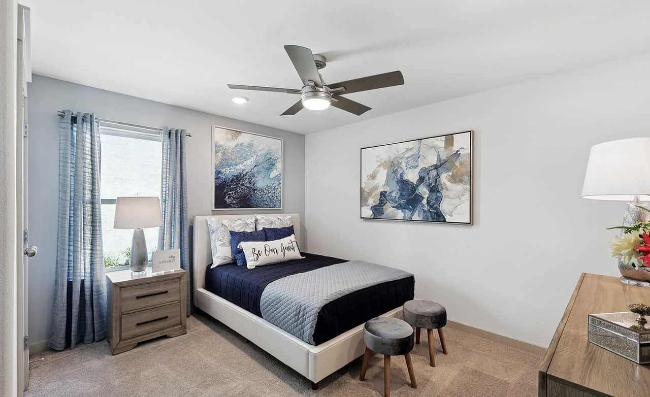 Chic Walden Pond bedroom with plush textiles, elegant art, and contemporary finishes.