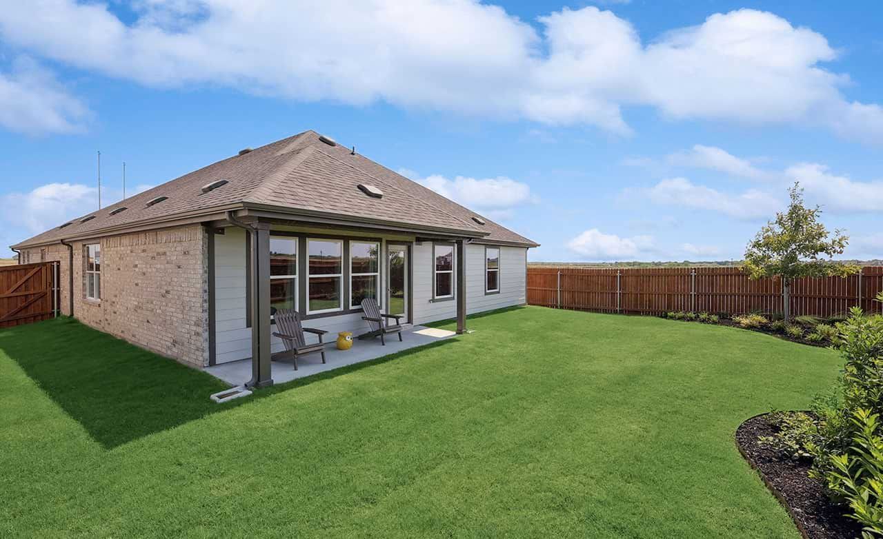 Elegant brick exterior with expansive windows reflects sophistication in Walden Pond.