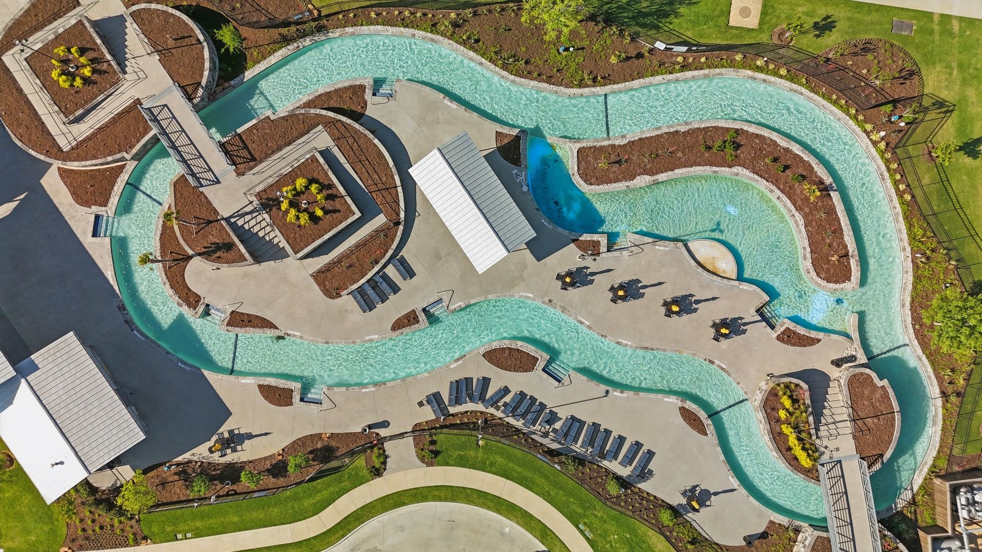 Experience relaxation with the winding lazy river and exquisite landscaping at Wildflower Ranch, Texas.