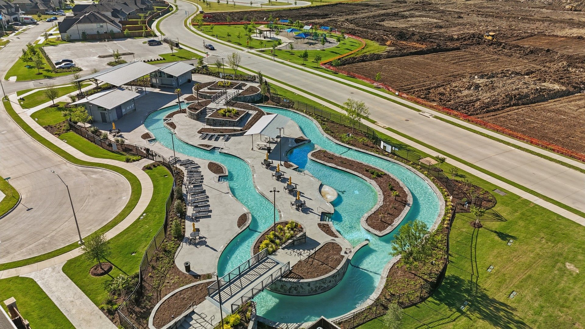 Experience modern luxury with this sculptural lazy river, set in the refined Wildflower Ranch, Texas.