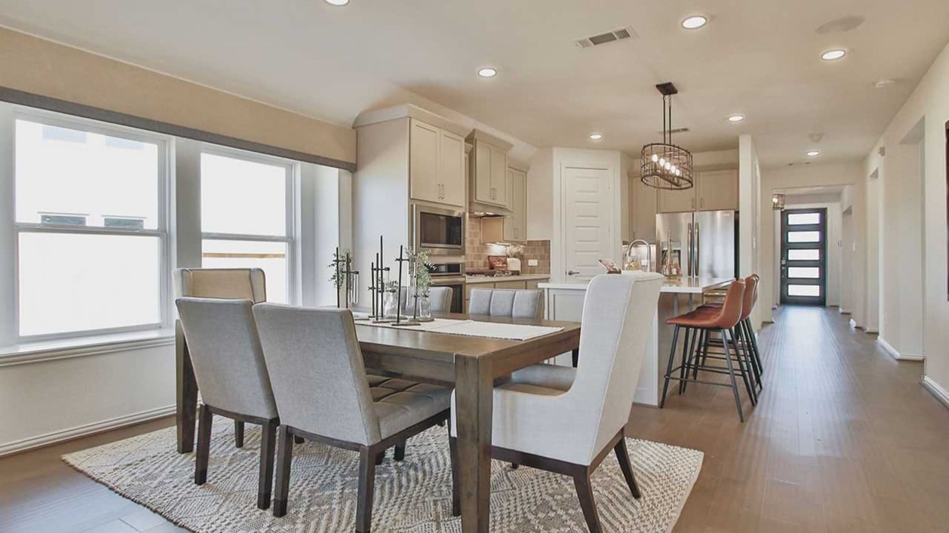 Elegant open-concept layout with luxurious finishes and contemporary design in Cypress Green community.