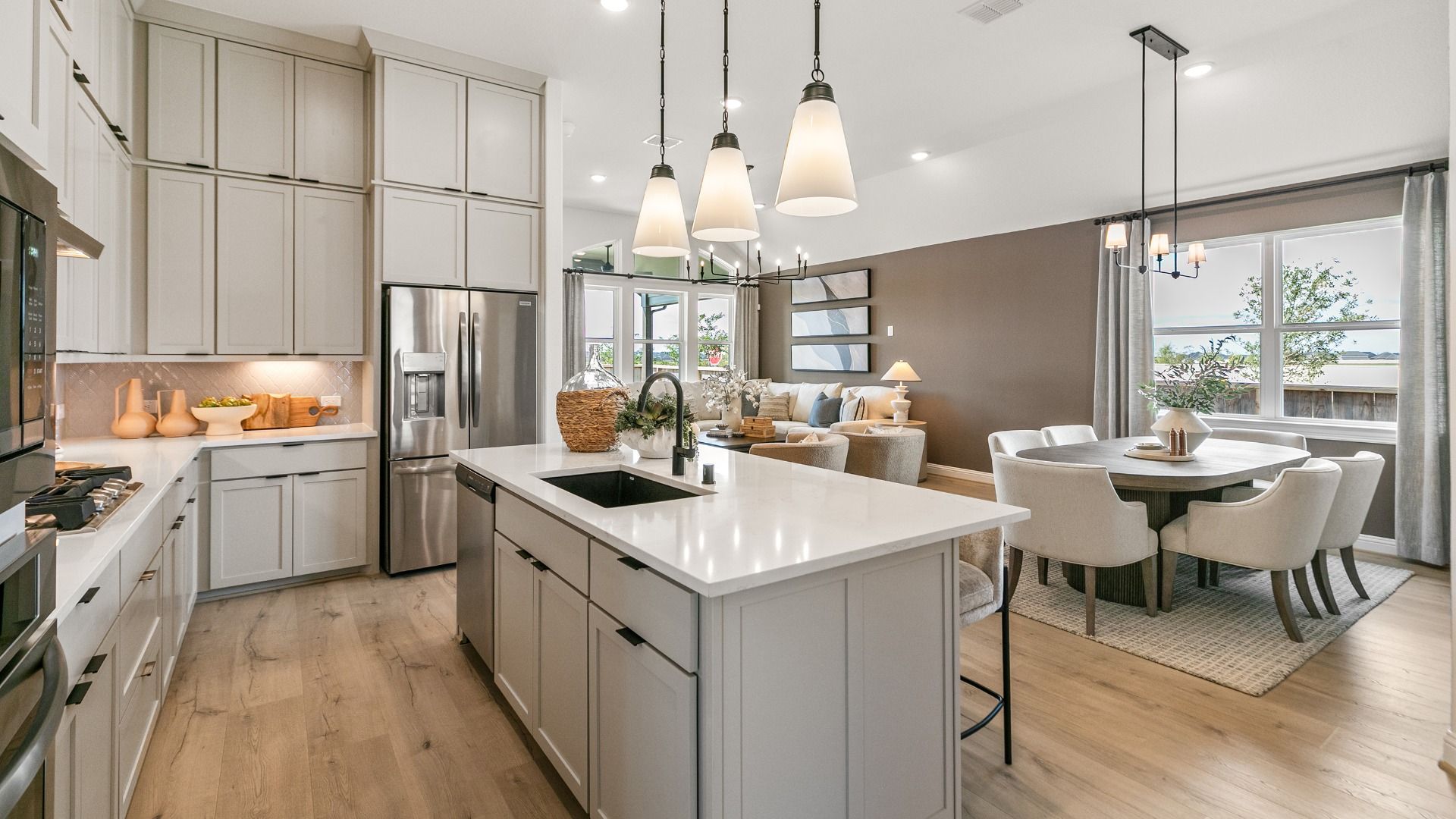 This open concept layout connects the kitchen and living space for easy interaction and entertaining.