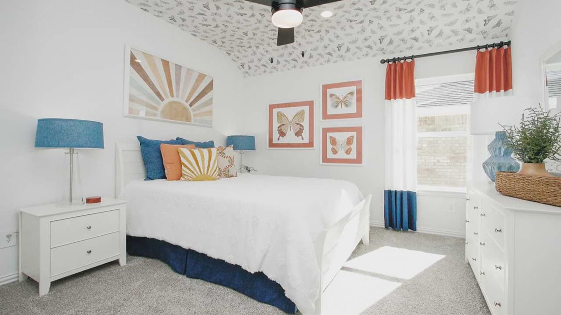 Discover refined elegance with custom butterfly ceiling, sunburst wall art, and vibrant accents in Cypress Green.