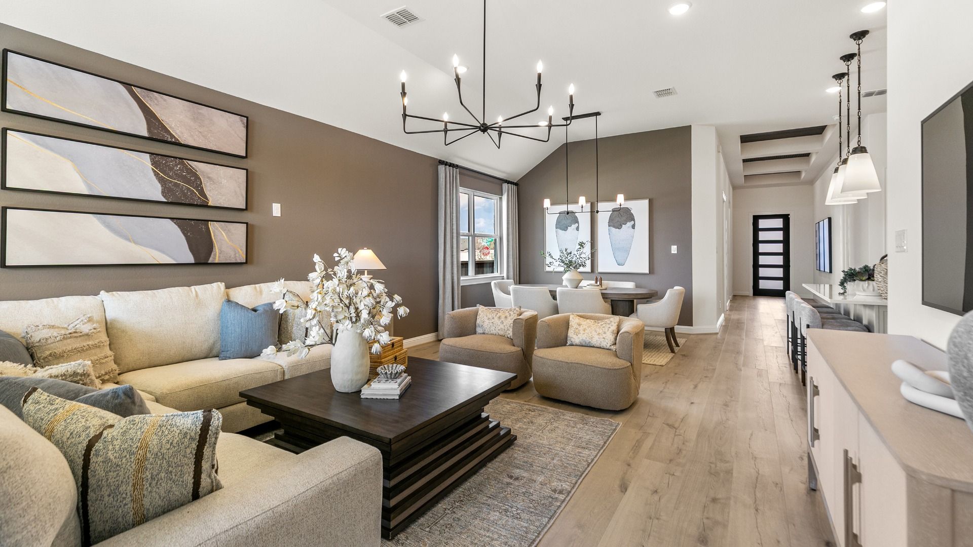 This open concept living space transitions beautifully into the dining area for easy everyday living.