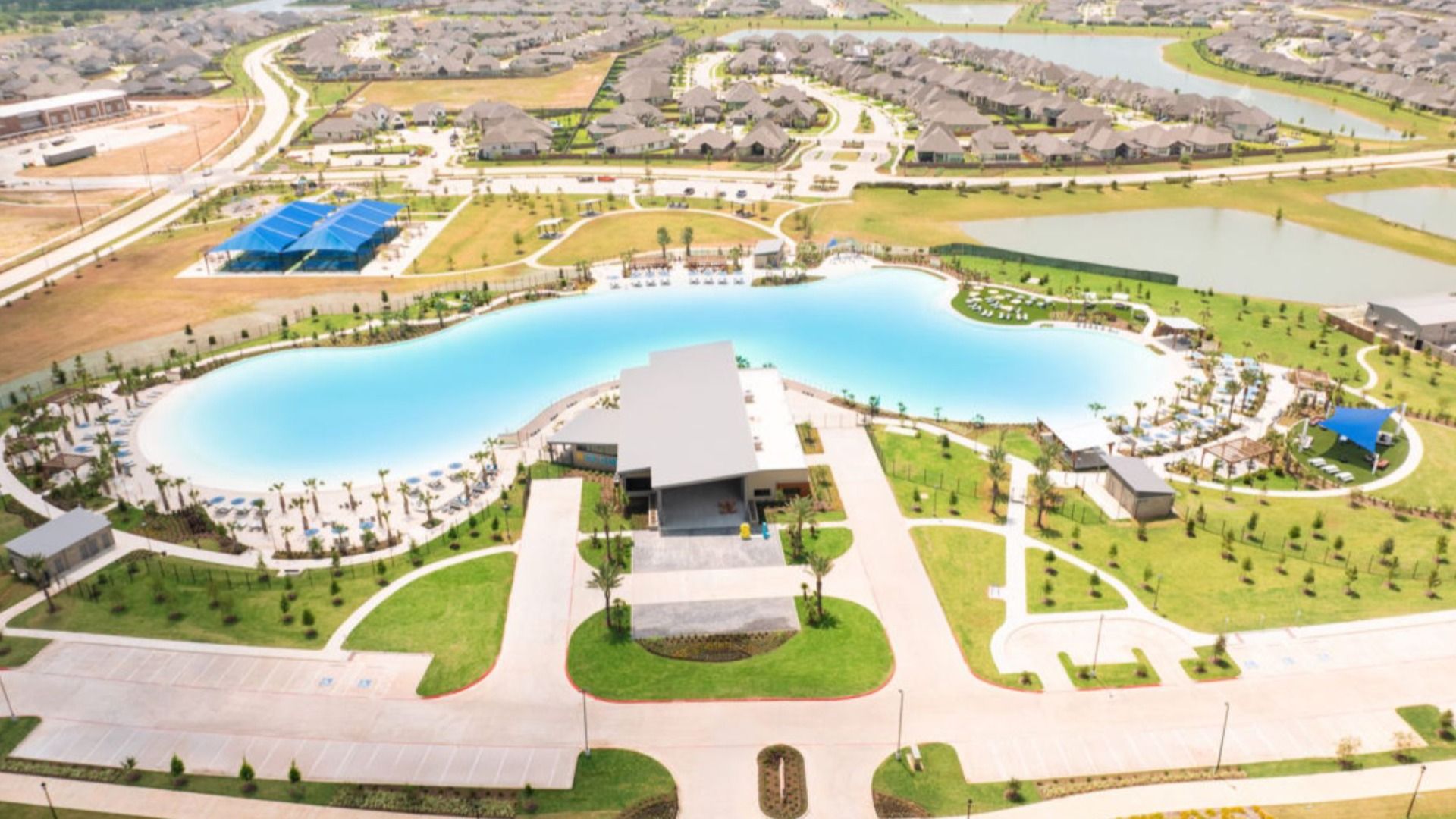 Experience Sunterra's lagoon-side elegance, accentuated by modern architectural refinement in a serene suburban haven.