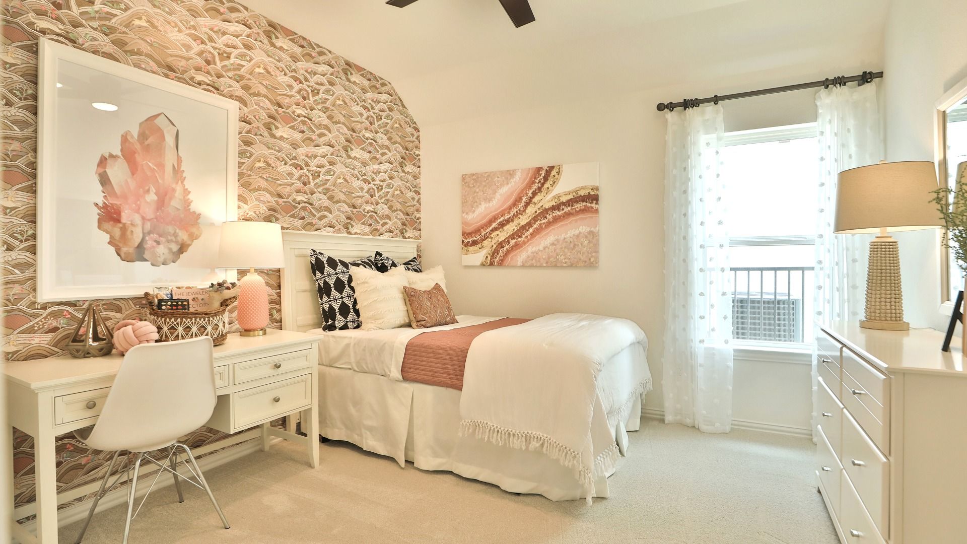 This Bridgeland bedroom boasts textured wallpaper and chic, contemporary furnishings, epitomizing modern elegance.