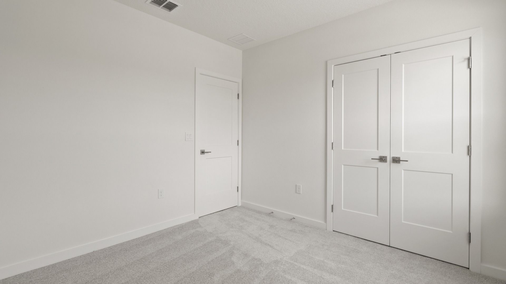 Third Bedroom and Spacious Closet in the Flagler floor plan by DRB Homes in Hamilton Bluff.