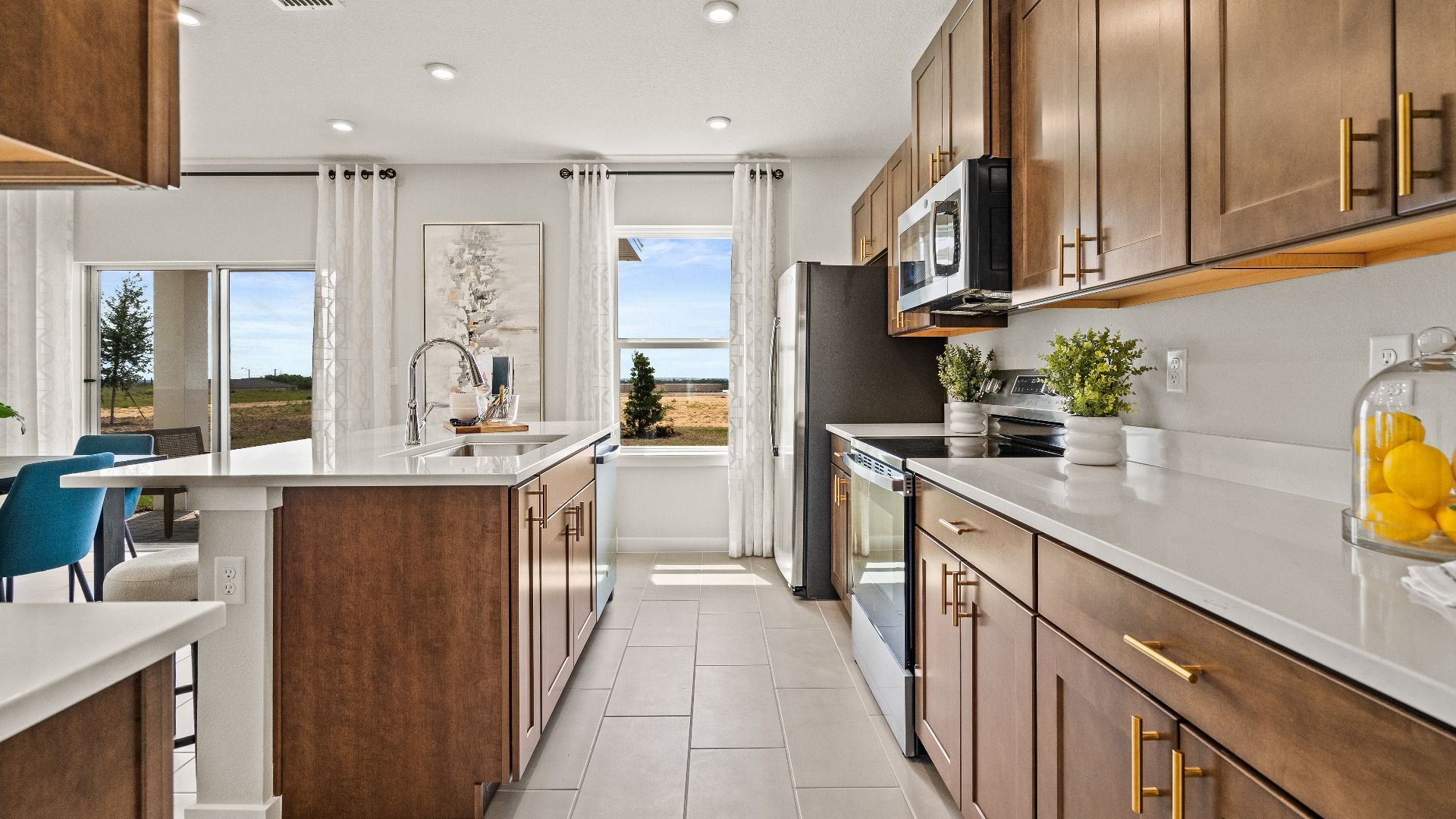 The Kitchen in the Model Highbourne by DRB Homes in Hamilton Bluff located in Haines City, FL.