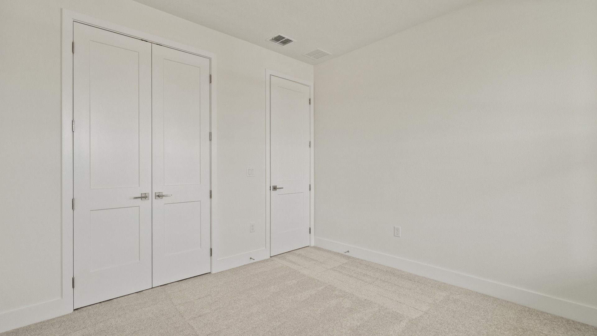 The third bedroom with a spacious closet of the Buttonwood by DRB Homes at Trailside in Mount Dora, FL.
