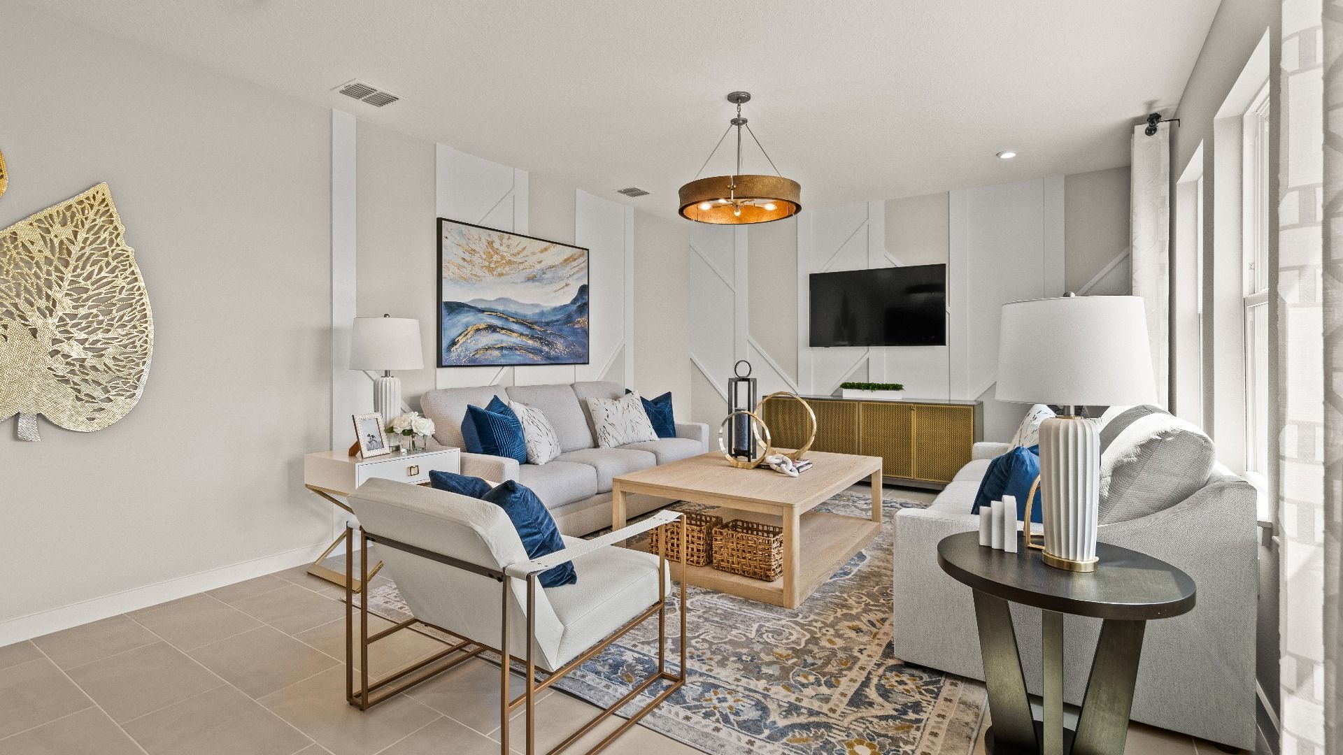The First Floor Living Area in the Model Highbourne by DRB Homes in Hamilton Bluff located in Haines City, FL.