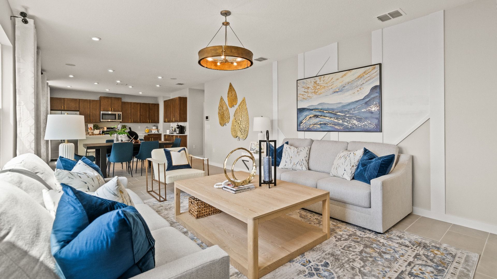 The First Floor Living Area in the Model Highbourne by DRB Homes in Hamilton Bluff located in Haines City, FL.