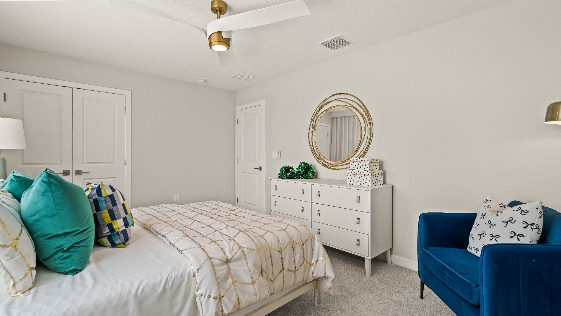 Secondary Bedroom with spacious closet in the Model Highbourne by DRB Homes in Hamilton Bluff located in Haines City, FL.
