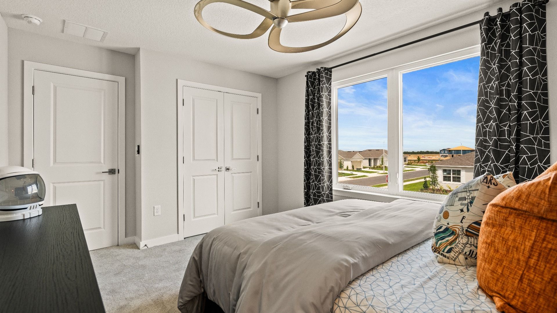 Third Bedroom with spacious closet in the Model Highbourne by DRB Homes in Hamilton Bluff located in Haines City, FL.