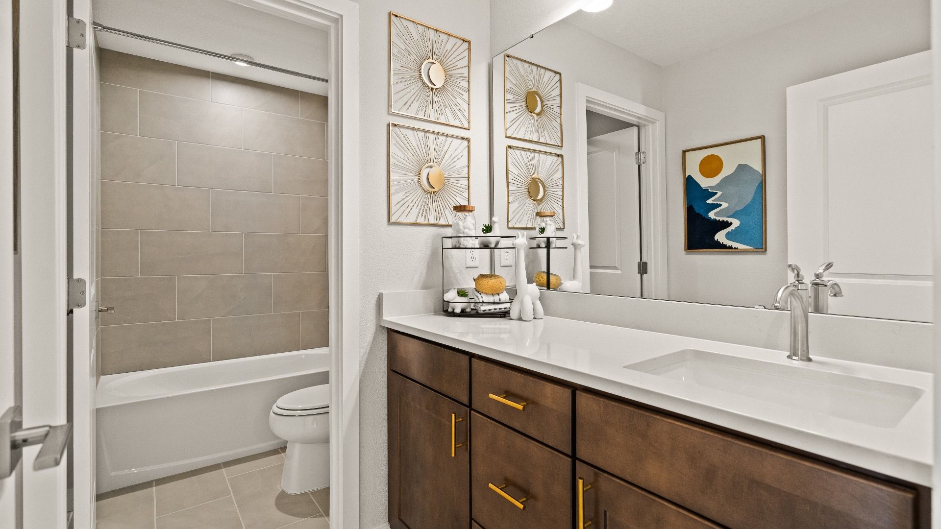 Secondary Bathroom in the Model Highbourne by DRB Homes in Hamilton Bluff located in Haines City, FL.