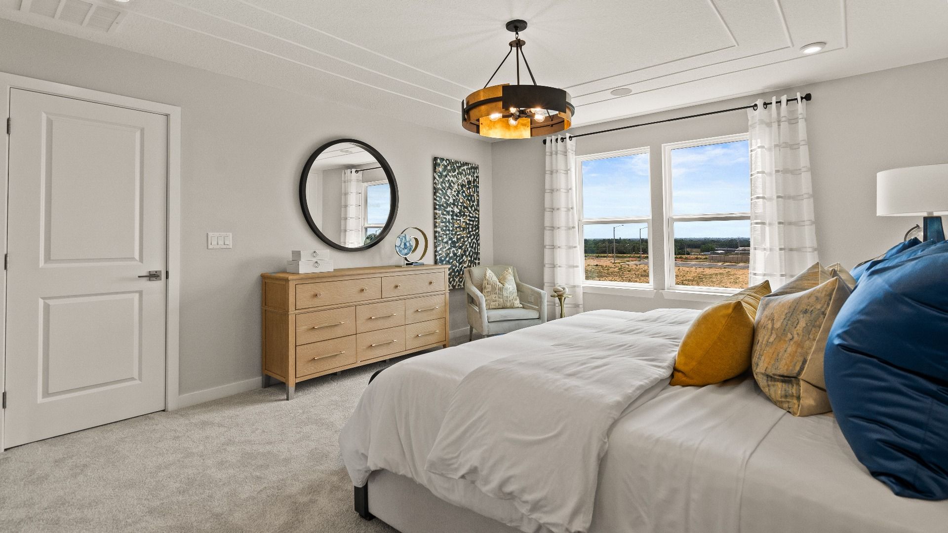 Primary Suite in the Model Highbourne by DRB Homes in Hamilton Bluff located in Haines City, FL.