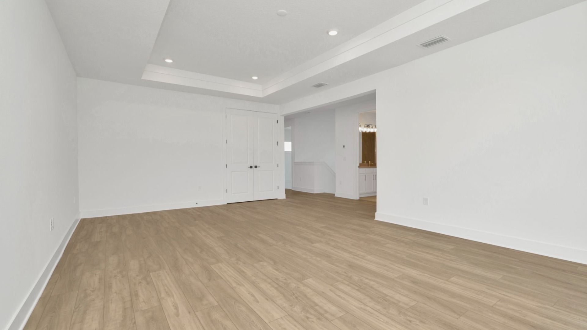 The Loft of a DRB Homes Grand Hawk which is offered as a home plan at Serengeti in Spring Hill, FL.