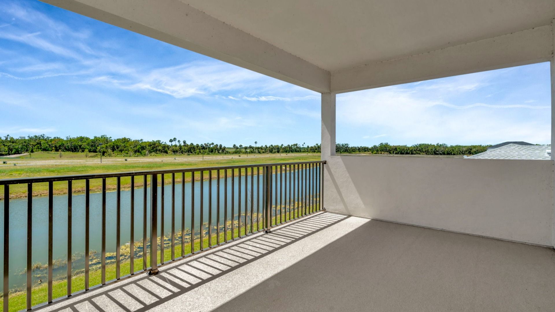 The Balcony of a DRB Homes Grand Hawk which is offered as a home plan at Serengeti in Spring Hill, FL.