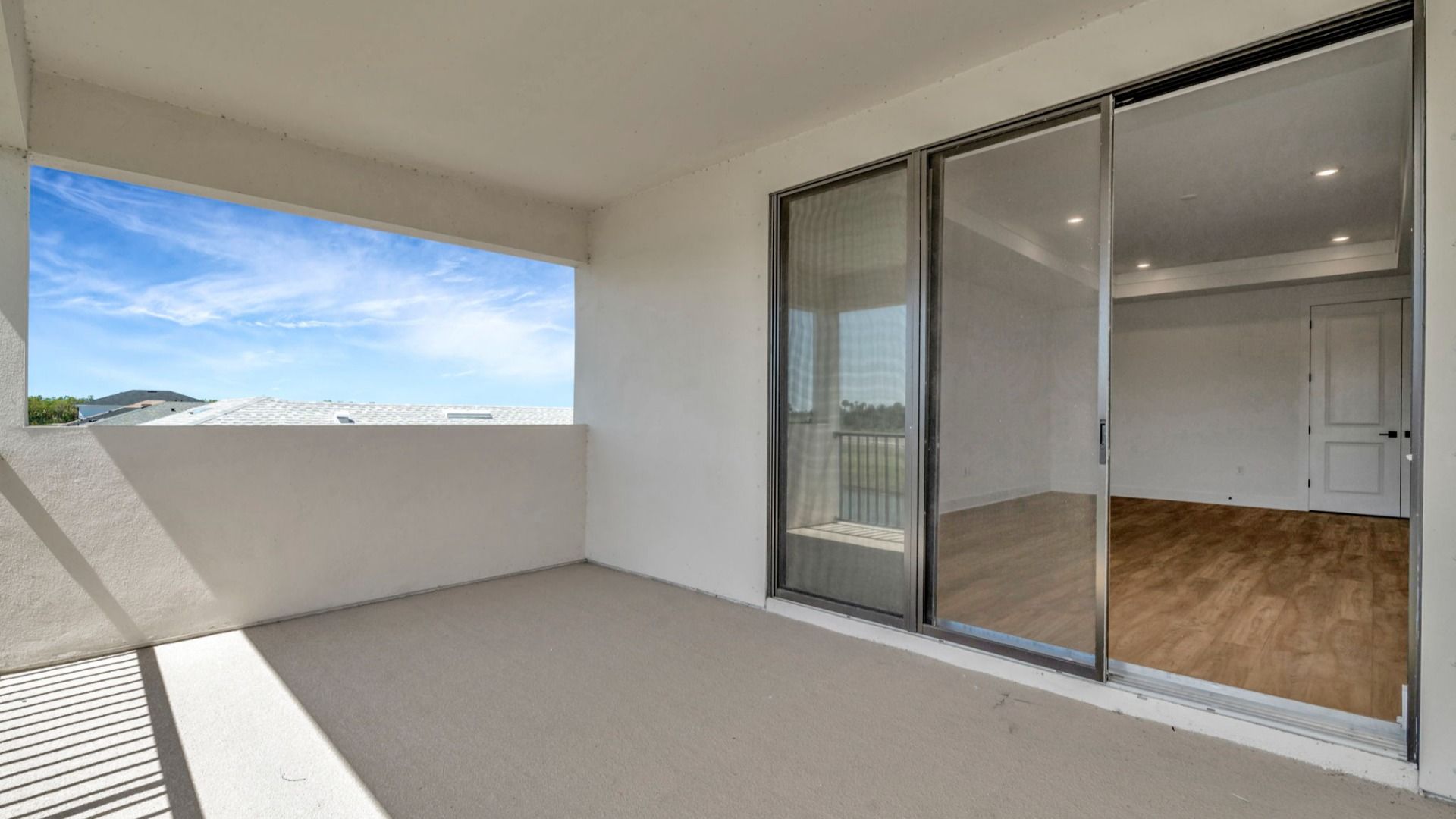 The Balcony of a DRB Homes Grand Hawk which is offered as a home plan at Serengeti in Spring Hill, FL.