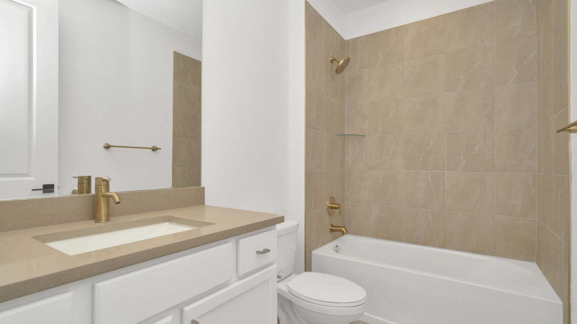 The Fourth Bathroom of a DRB Homes Grand Hawk which is offered as a home plan at Serengeti in Spring Hill, FL.