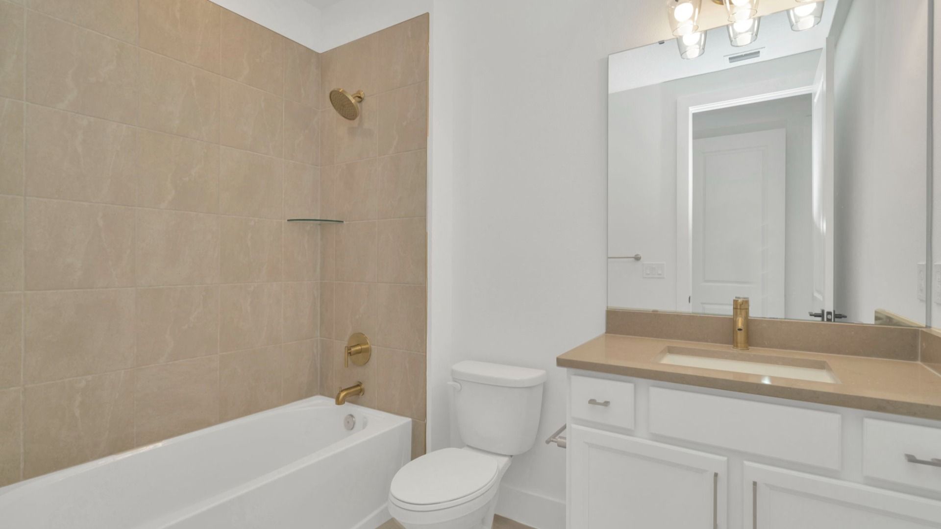 The Fifth Bathroom of a DRB Homes Grand Hawk which is offered as a home plan at Serengeti in Spring Hill, FL.