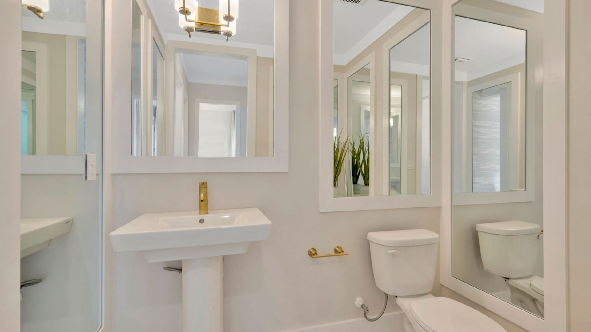 The Half Bathroom of another Grand Sabal Model which is available at Serengeti.